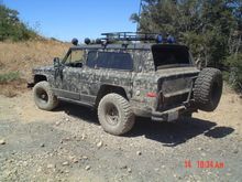 We have room to carry 3 full sized spares, which we often do. And yes, one of the 33's actually fits... er well, crams pretty nicely underneath.