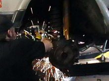 Just cutting off the lower sway link bolts to upgrade the hardware.