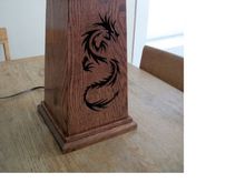 Here is the dragon light in the daylight. The cool thing about this is that I made it out of old skid wood. It is all oak that was planed at different thicknesses