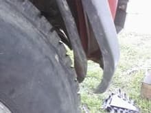 the inner fender thing is seperated, fender is bent.