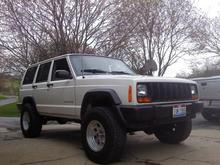 My new XJ! 3'' lift on Hankook 31's with American Racing rims.