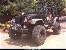 my 1999 tj 4.5 in susp lift,front dana 30 aussie locker,3in body lift
rough country winch mount,8000 smittybilt winch,54in smittybilt trail jack and warrior products hood jack mount.