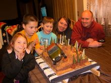 Brad and his family with the cake!