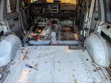 I'm happy the cargo area isn't all that rusty but the passenger quarter panel had about 2" of standing water in it after sitting in this garage dry for 3 weeks. 
