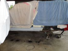 I used a combination of plastic wrap, blankets, sheets, masking tape, newspaper, and aluminum foil