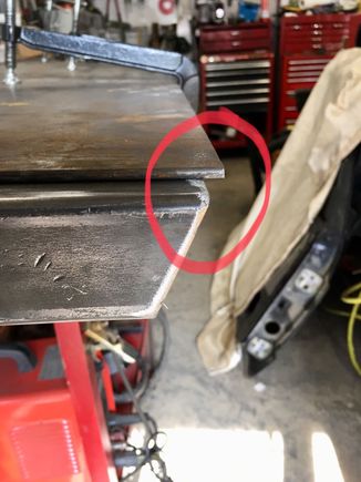 I left about a 1/4” overhang on the inboard side. There is a angled area on the frame that this will contact to make welding easier and provide better support.