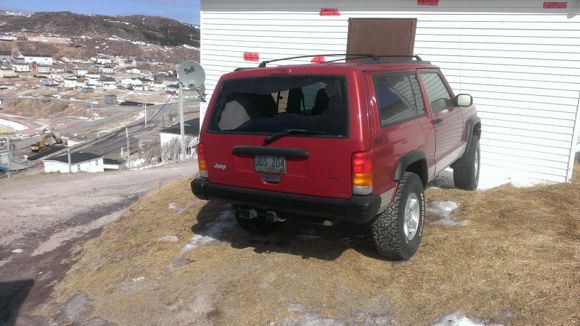 160 km winds, tape on the side of house from blowing rocks. Lost windshield last winter