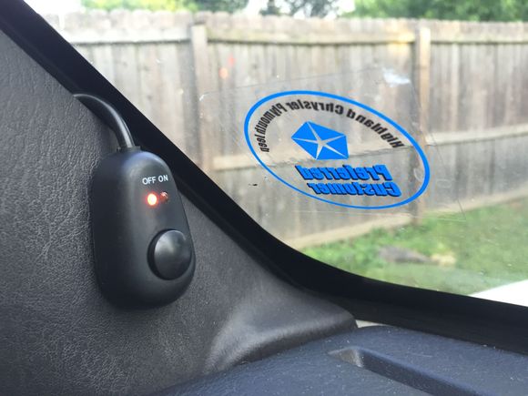 Switch is mounted just on the inside of the driver portion of the dash. Out of the way but easily accessible.