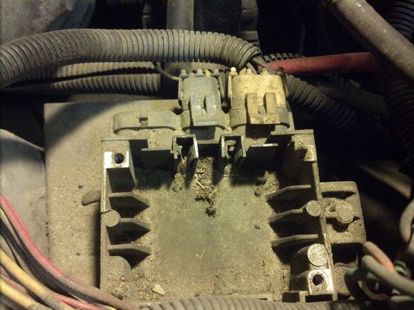 Vacuum out the crap, give the contacts a good brushing/cleaning and bend them back in so they make better contact.