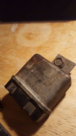 relay where wires had melted 2nd time around. what is it for? (friend says: heater choke relay). none of numbers show up when searched, not sure how to replace it. thought maybe there was an issue with this, that's why wires had melted right by it, and that's why I wanted to replace it.