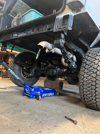 Removed the bumper, hitch and fuel tank to start the shackle bracket install