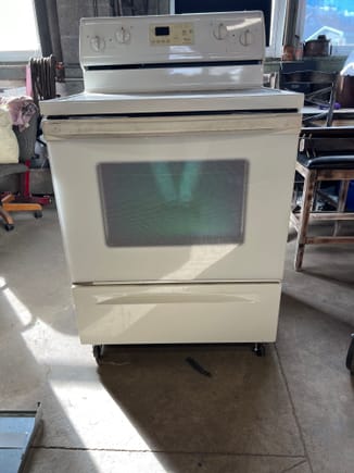 I got this old oven from my aunt to turn into a powder coating oven. I threw a set of caster wheels on the frame and made a new cable for it that would allow me to plug into my 240V welder receptacle. 