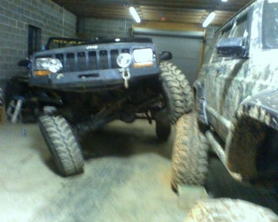 Testing my long arm kit. Those are 42's I'm climbing on and the rear is still on the ground!!!
