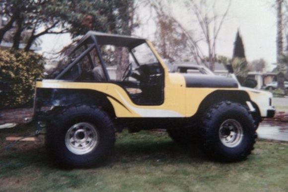 My 80 CJ5 w/350 Radiator,electric fan and 2 Gal fuel cell in back ..38'' Super Swampers