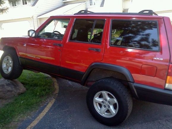 Fresh coat of wax brought back the shine that was severely missing.  Also painted the fenders, rear bumper, and rocker panels with non skid and flat black.