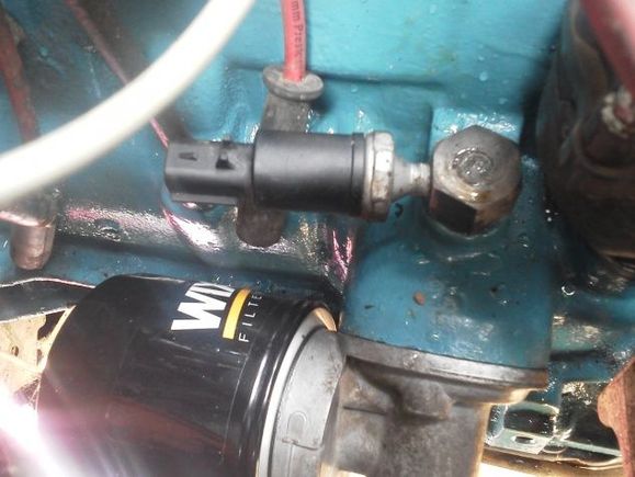 Here is the location of The sender. All you do is unplug it and unscrew it. Be sure to use sealer on the threads of a new one, I like liquid Teflon. But thread tape will work.