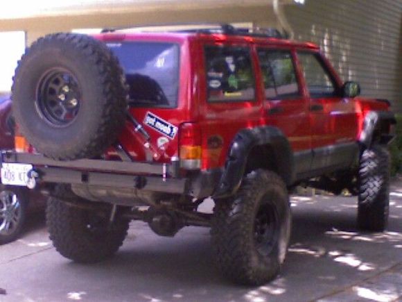 rear bumper with tire and hi-lift jack mounted