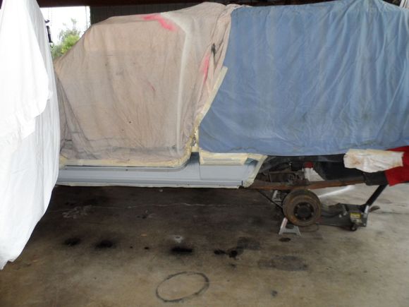 I used a combination of plastic wrap, blankets, sheets, masking tape, newspaper, and aluminum foil