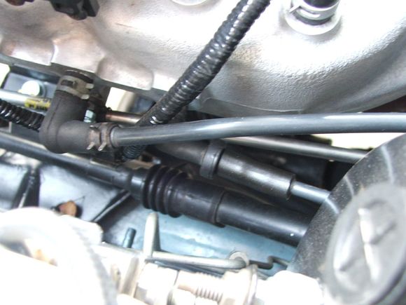 Intake vacuum check valve