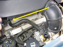 This hose, sometimes the throttle body end , that plastic round piece gets damaged.
Note how the part of the hose parallel to the valve cover is turned up so oil flows back into the valve cover. 