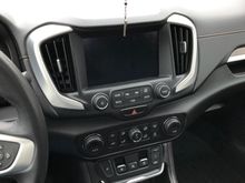 The HAVC , shift buttons and infotainment centre