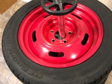 They are stacked on this stand , the tires do not touch