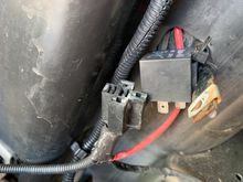 Relay zip tied to a bumper cover mount
