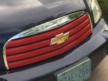 But the grille is supposed to be red, not the fenders bumper and hood