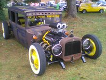 Rat Rod has right hand drive. My little yellow mini panel in the background