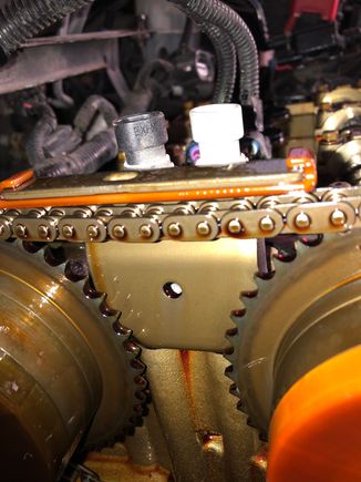 This was my 2.4’s loose chain last year, it was stretched and that front guide was broken.
I installed a cheap chain kit from EBay, and had to replace it , in December. I stepped up to Cloyes kits for timing and balance shaft chains, no more noise, I also installed a Melling upper guide replacement bolt. 
