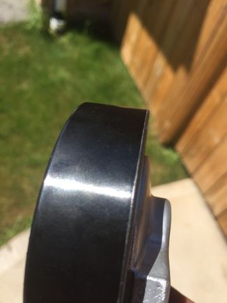 Nice new smooth pulley, the old one has a wear pattern and a ridge on it.