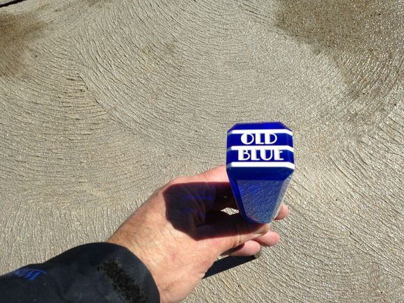 The knob rests on the plunger in the shifter