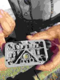 A damaged Holley carb jet block