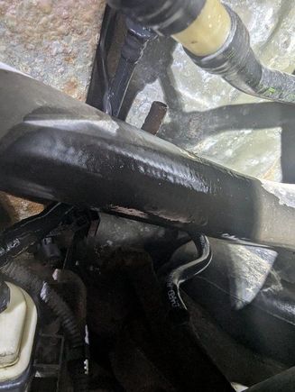 See the wet tube below the fuel filler pipe and that dry tube end above it