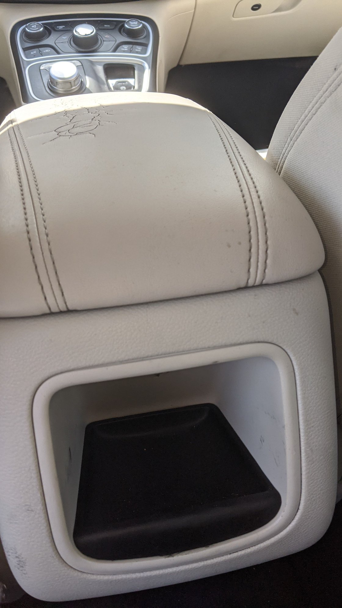 2016 Chrysler 200 center console armrest removal for reupholstering