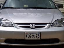 This picture shows my new aftermarket JDM headlights with 10k HID kit installed as well