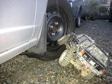 Climbing the tire with my RC rock crawler lol