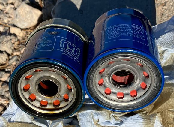 Old leaking OEM filter on left (no damage), new OEM filter on right.