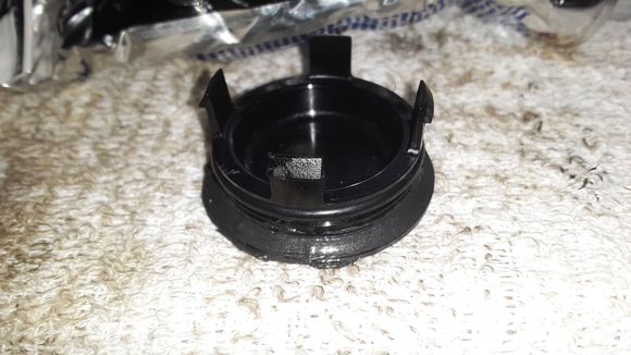 RTV sealant on inner lip of cam plug (redundant seal)