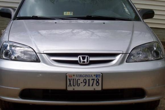 This picture shows my new aftermarket JDM headlights with 10k HID kit installed as well