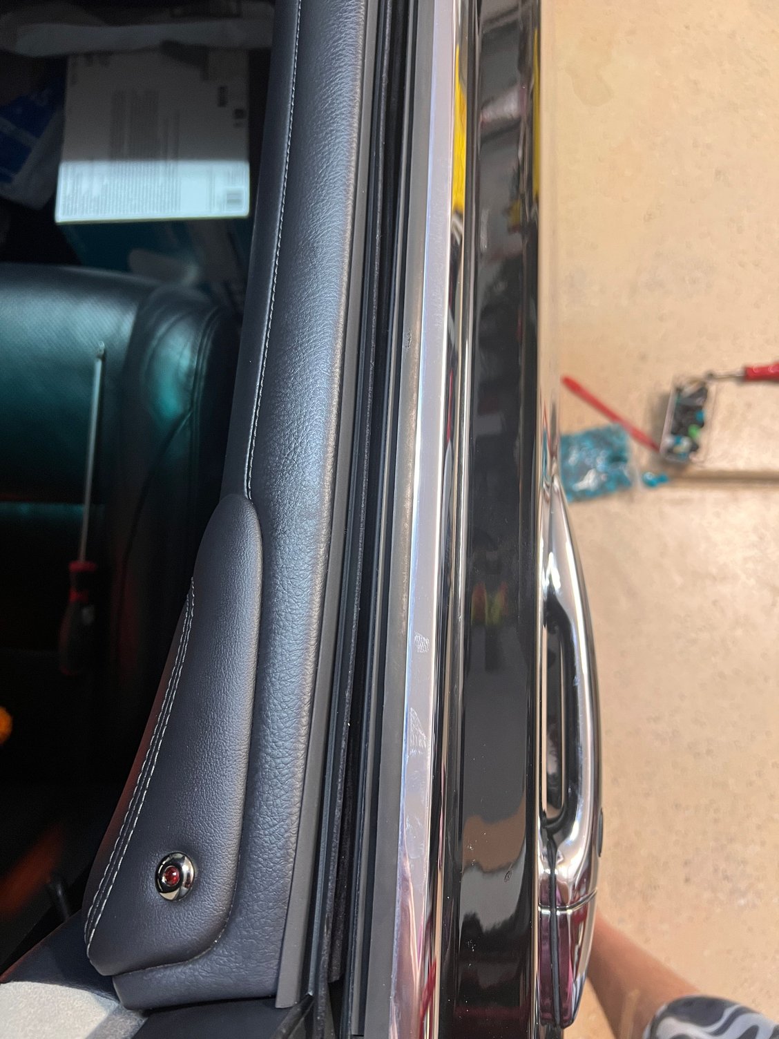 I also think the gap is larger here than on the other doors.  Like the panel is not sitting all the way flush as it should.  