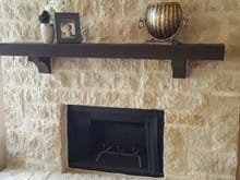 Fireplace hearth and mantle stone and stain.