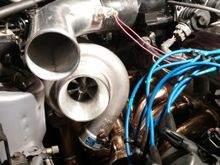 Here is a pic of the turbo installed and piping test fitted to check for clearence