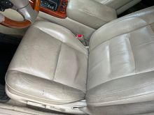 The drivers seat and armrest are the most worn items in the car.