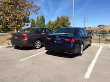 Parked next my sib's 2014 335i. I think the 450h is more substantial looking. No hate, the 335i is a looker too.