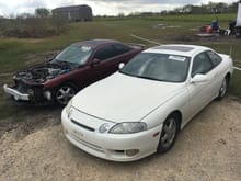 Both from coparts both ran grate . The white car has passenger side 1/4 panel damage