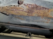 Rust at rear passenger side jack point.