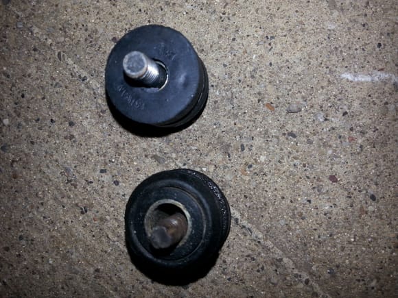 Aftermarket rubber bushing/spacer at top , OEM rubber bushing/spacer at bottom.
OEM bolts inserted to show utter disregard for fitment