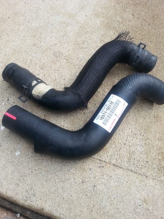 Toyota/Lexus hose at bottom. The aftermarket hose collar is frayed mesh and doesn't really do anything, while the OEM hose has a thick rubber collar that at least performs an insulating function and allows the hose to hold its shape