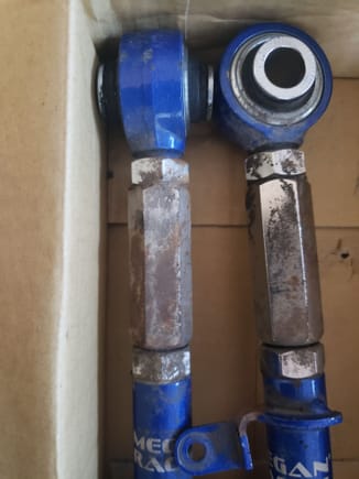 Pick up a set of used megan rear front camber arm.